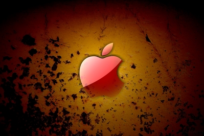 High def wallpaper of Apple logo on rusted paint.