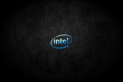 High def desktop background featuring glass Intel logo on black leather.